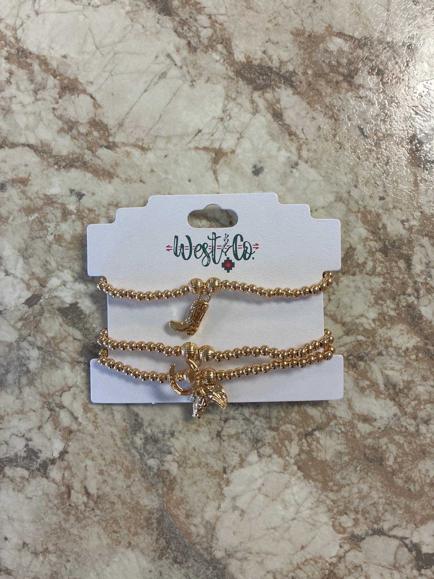 BR1526G West & Co. 3 Piece Set of Dainty Gold Beaded Stretch Bracelets with Cowboy Charms