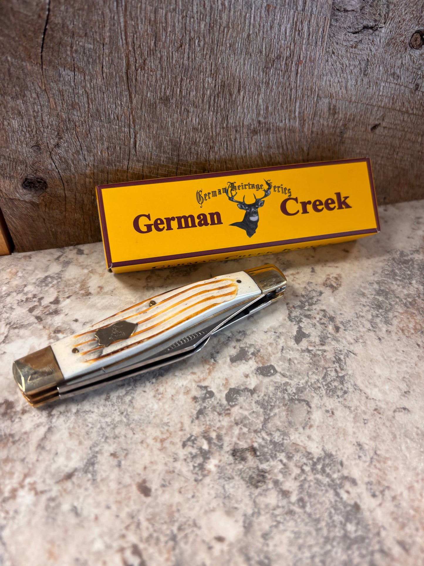 EM2567053BJWBN German Creek Burnt White Jig Bone Folding Pocketknife
