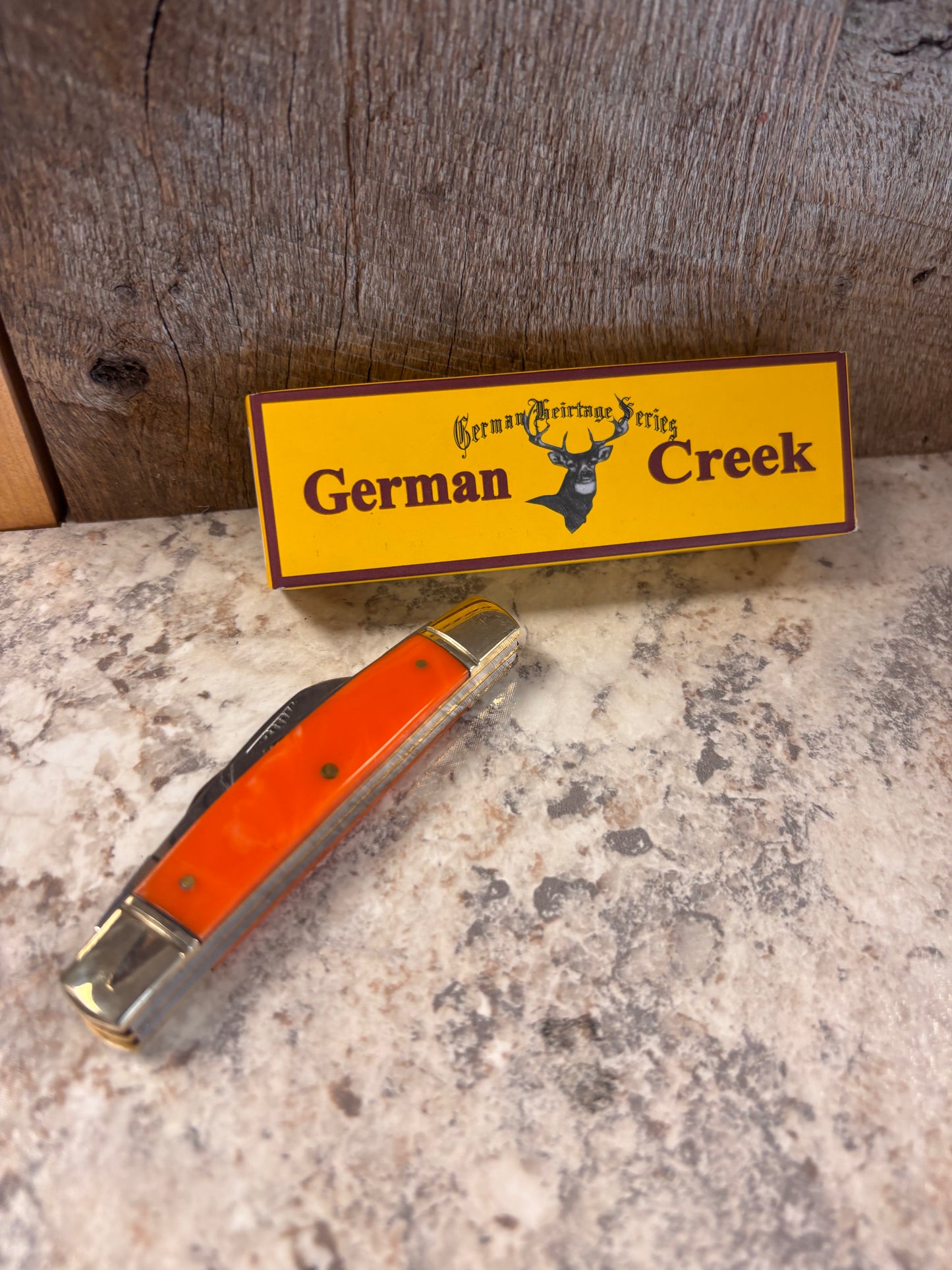 EM2567064060-GC German Creek Orange Folding Pocketknife
